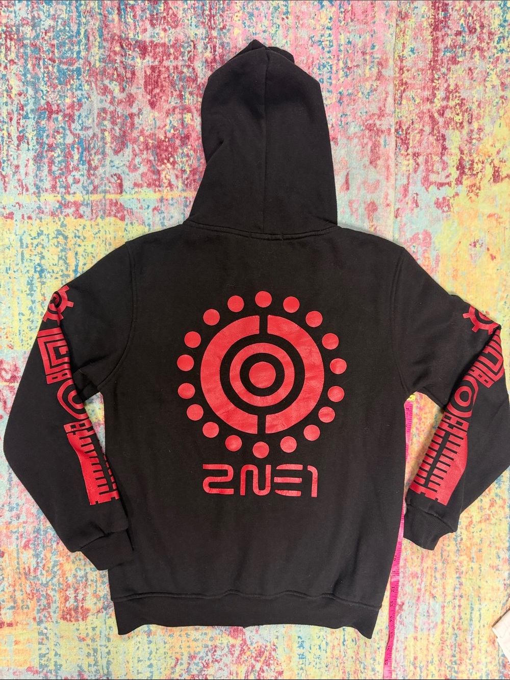 Black Zip-Up Hoodie with Red Sleeve Graphics
